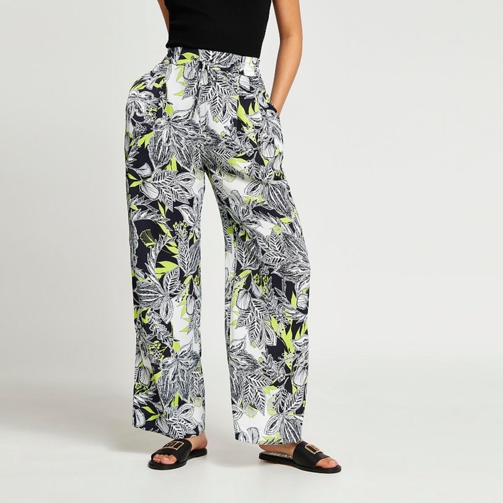 Black floral print pleated wide leg trousers